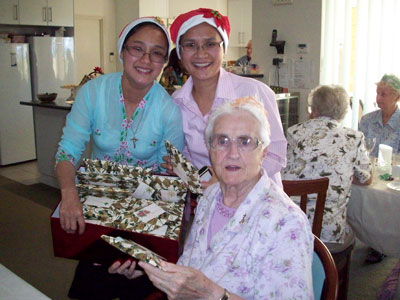 Two Christmas Elves (Srs Lilian and Chalermsrie) with Sr Anastasia