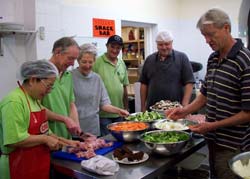 Sr Noelline with a band of volunteers as she cooks for the homeless at St Pat's Care